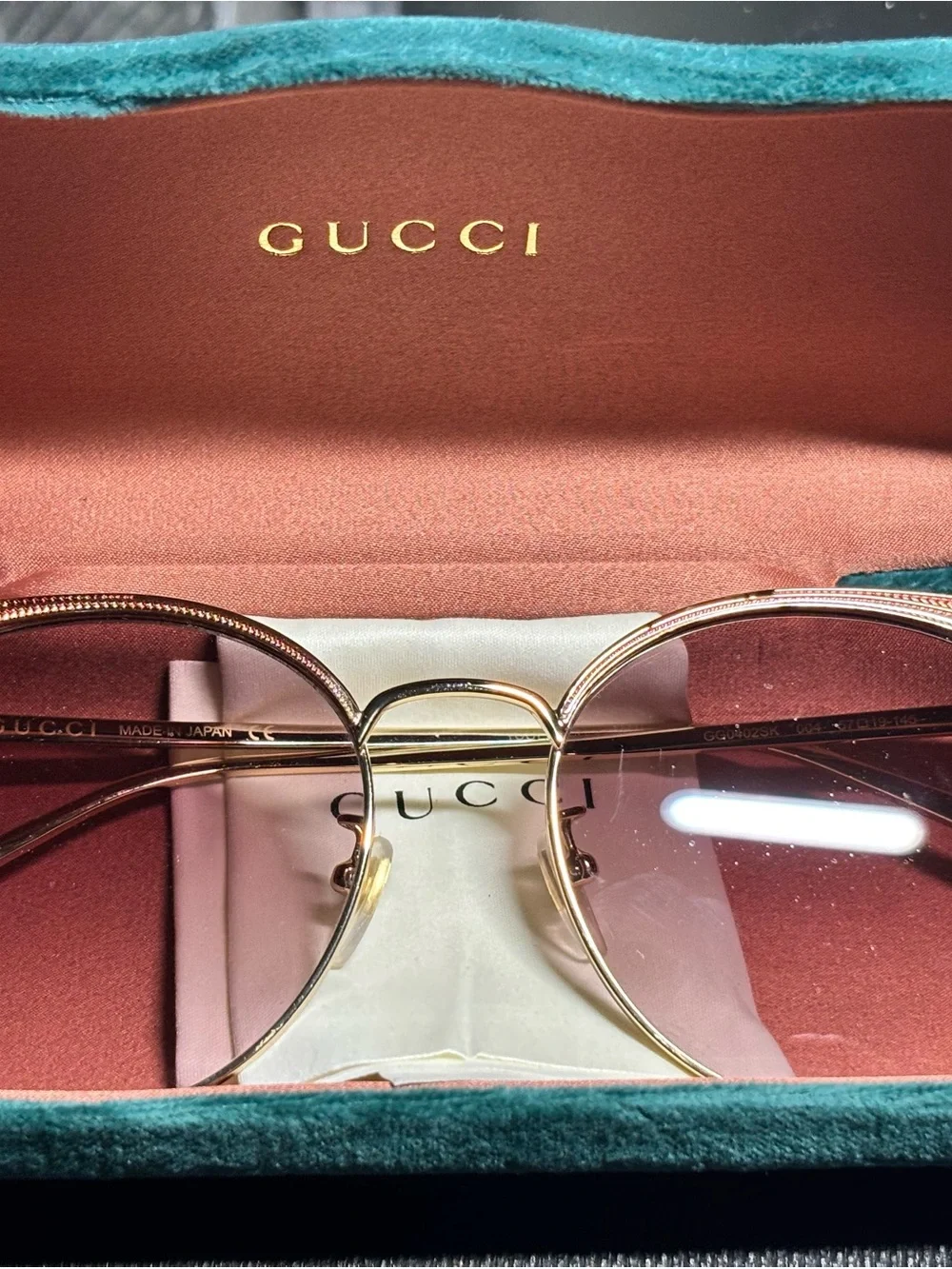 Gucci Gold Frame Pink Lens Round Sunglasses